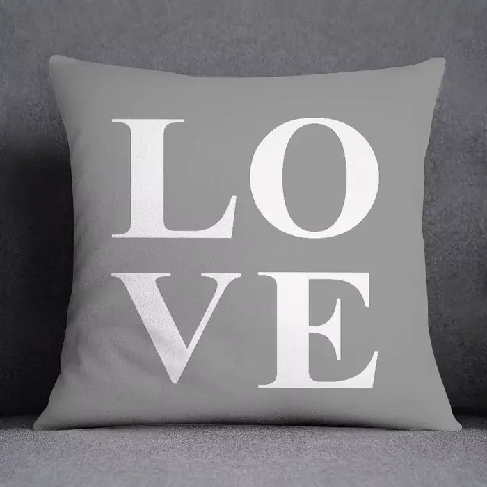 Housse de coussin géométrique gris et blanc